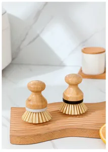 Wooden dish brush detail view, natural wood handle and dense bristles for kitchen cleaning.