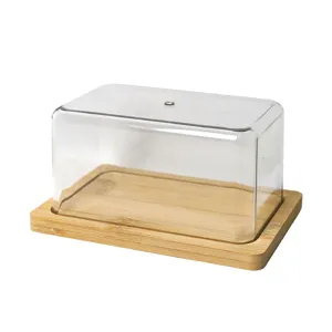 Scatola per burro trasparente con base in legno di bambu per la conservazione degli alimenti.