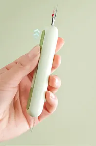 Handheld threader and seam ripper tool for sewing, easy multi-function crafting helper.