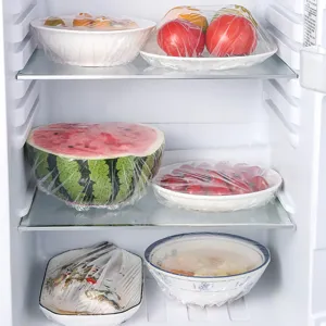 Disposable elastic food covers for bowls, plates, and fruit storage in the refrigerator.