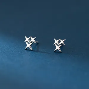 Exquisite S925 sterling silver four pointed star earrings, minimalist design detail view.