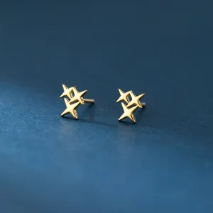 Exquisite S925 sterling silver minimalist four-pointed star stud earrings detail view.