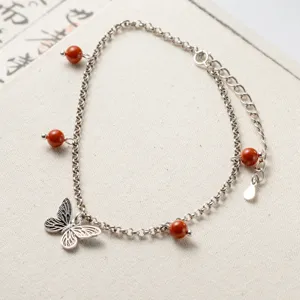 Exquis chevillère papillon en argent sterling S925 avec perles d'agate rouge, vue détaillée.