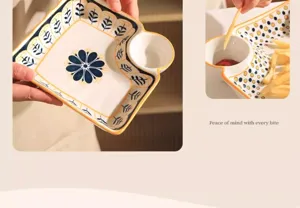 Detailed view of ceramic divided plate with dip bowl, blue floral pattern, perfect for snacks.