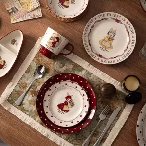 Ensemble de vaisselle en céramique avec motif de lapin, assiette et bol rétro.
