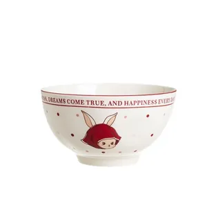 Bol à riz en céramique motif lapin mignon et pois, idéal pour les repas à la maison.