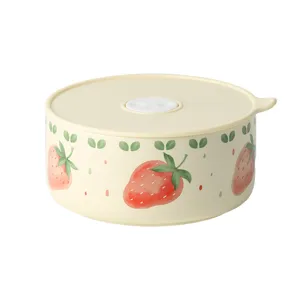 Ceramic microwave safe lunch box bowl with lid and cute strawberry pattern for daily use.