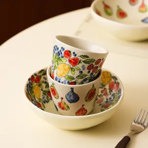 Retro ceramic bowl and plate set with fruit patterns, ideal for salad, yogurt, and daily meals.