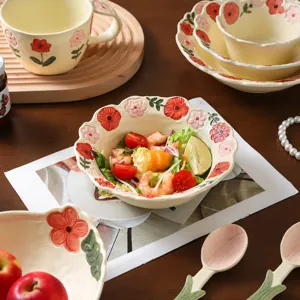 Chic ceramic tableware set with cute floral relief, perfect for daily dining and salad serving.