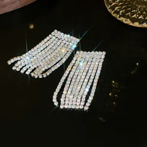 Sparkling rhinestone multi-strand fringe detail shot for elegant evening party wear.