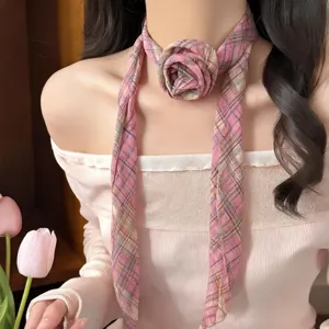 Detail shot of French vintage pink plaid chiffon rose choker scarf, highlighting exquisite neck craft.