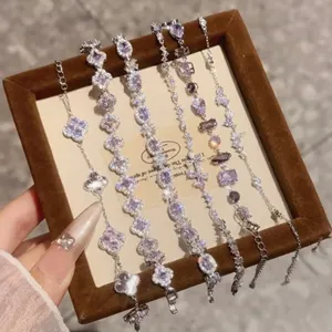 Elegante juego de pulseras de trébol de cristal morado plateado joyería de lujo retro