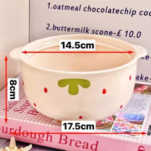 Ceramic soup bowl detail showcasing cute strawberry pattern, double-eared design for daily use.