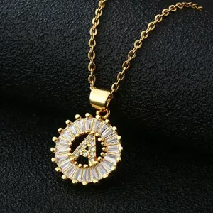 Gold plated copper initial letter A pendant necklace with sparkling white cubic zirconia stones.