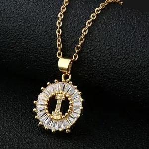 Gold-tone stainless steel initial I pendant necklace with sparkling baguette cubic zirconia halo.