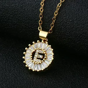 Exquisite gold-plated round letter E zircon pendant necklace detail view, elegant clavicle chain.