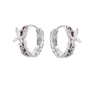 Silver fairy butterfly hoop earrings with dark red gemstone details, stylish niche jewelry piece.