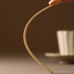 Premium bamboo coffee stirrer, flexible and eco-friendly wooden stirring stick for cafe use.