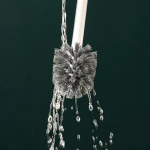 Wall-mounted toilet brush set with long handle for deep bathroom cleaning and easy drainage.