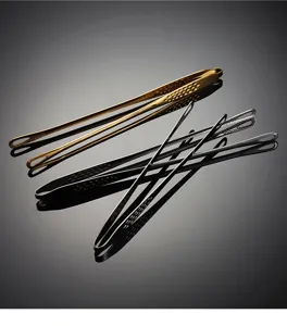 Stainless steel food tongs detail, durable barbecue steak clip with anti-scald design.