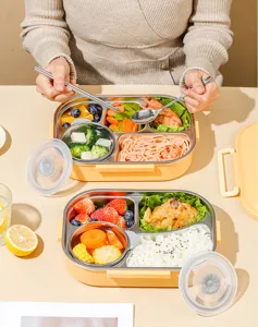 Roestvrijstalen bento box met meerdere compartimenten, lunchbak voor op kantoor.