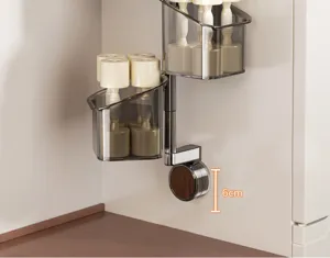 Vista detallada de la cesta de almacenamiento giratoria de pared con cajas transparentes.