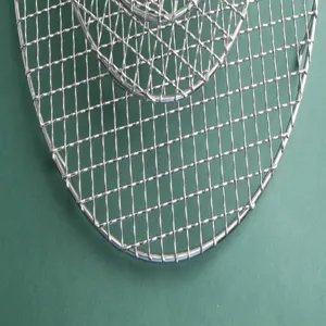 Stainless steel round grilling mesh wire rack with feet detail for air fryer and BBQ tool.