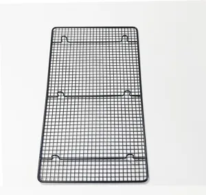 Detailed view of black wire cooling rack for baking, rectangular non-stick bread grid.