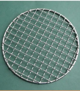 Stainless steel round grill net detail, thickened metal mesh, durable barbecue accessory.