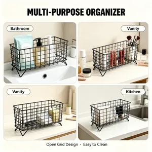 Black metal wire storage basket with raised feet, ideal for bathroom, vanity, and kitchen use.