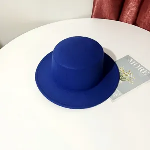 Blue wool flat top hat detail view showing premium felt texture and stylish design for daily wear.