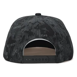 Black snapback hat with stylish graffiti print and adjustable strap for street fashion wear.