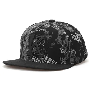 Detailed view of the trendy black and white hip-hop flat brim cap with letter K and print.