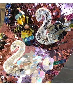 Sparkly sequin baseball cap with luxury rhinestone bee and swan appliques for women.