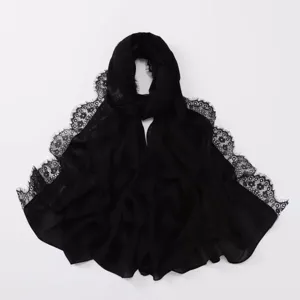 Details of the black chiffon hijab scarf with elegant eyelash lace trim for comfortable wear.