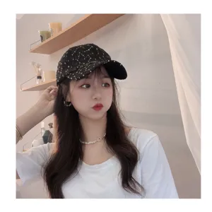 Korean style black floral embroidery baseball cap for women, sweet and breathable summer sun hat.