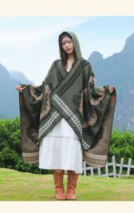 Retro ethnic style hooded knitted shawl cape, perfect for travel photography and stylish outdoor wear.
