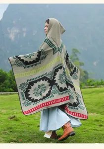 Retro ethnic style hooded cape detail, geometric knitted pattern outdoor travel apparel photo.