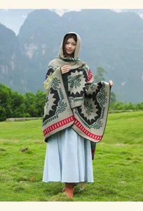 Retro ethnic style hooded shawl detail view featuring unique geometric pattern knitwear design.