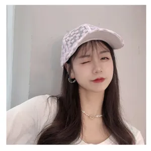 Daisy embroidered lace baseball cap detail view, sweet Korean style breathable sun visor hat.