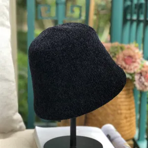 Japanese style black dome bucket hat for women, casual autumn and winter basin hat.