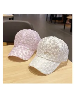 Daisy embroidered lace baseball cap for women, sweet breathable mesh sunshade visor hat detail.