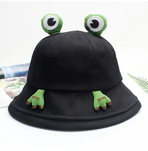 Cute black frog bucket hat detail showing 3D eyes and funny paw embroidery for spring summer.