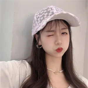 Floral embroidered mesh baseball cap for women, breathable pink summer sun hat streetwear.