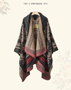 Details of the vintage ethnic style hooded cape showing geometric knit patterns and warm drape.
