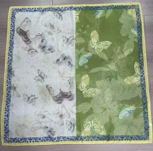 Close-up detail view showing the retro split-color butterfly pattern square silk scarf.