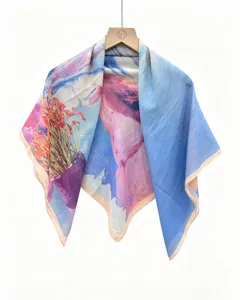 Close-up detail of vintage artistic oil painting scarf with vibrant floral print pattern.