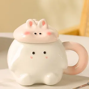 Cute ceramic cartoon rabbit design coffee mug detail, glossy smooth finish, pink blush accent