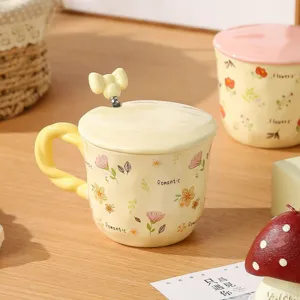 Cute ceramic coffee mug with lid and bow spoon, floral pattern, yellow gift cup for home