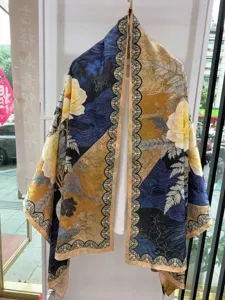 Detail view of a Chinese style floral print silk scarf, elegant shawl and scarf design.